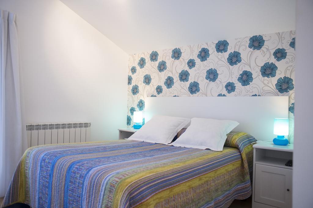 Hotel Quintana 23 Suances Habitación foto